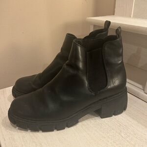 Women’s heeled platform booties.